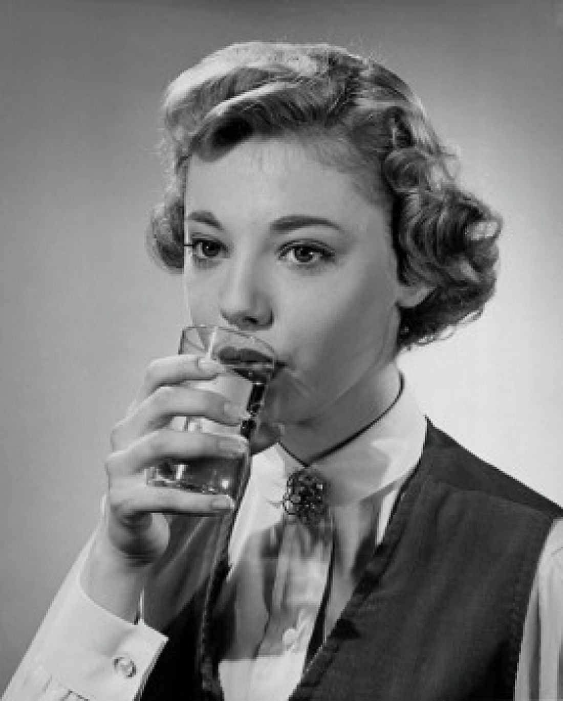 Close-up of a young woman drinking water Canvas Art - (18 x 24)