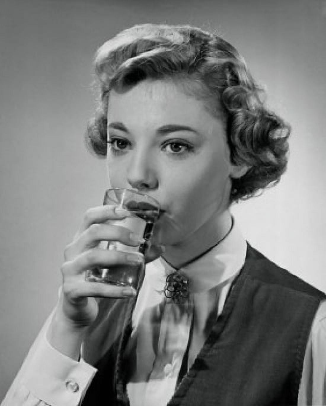 Close-up of a young woman drinking water Canvas Art - (24 x 36)
