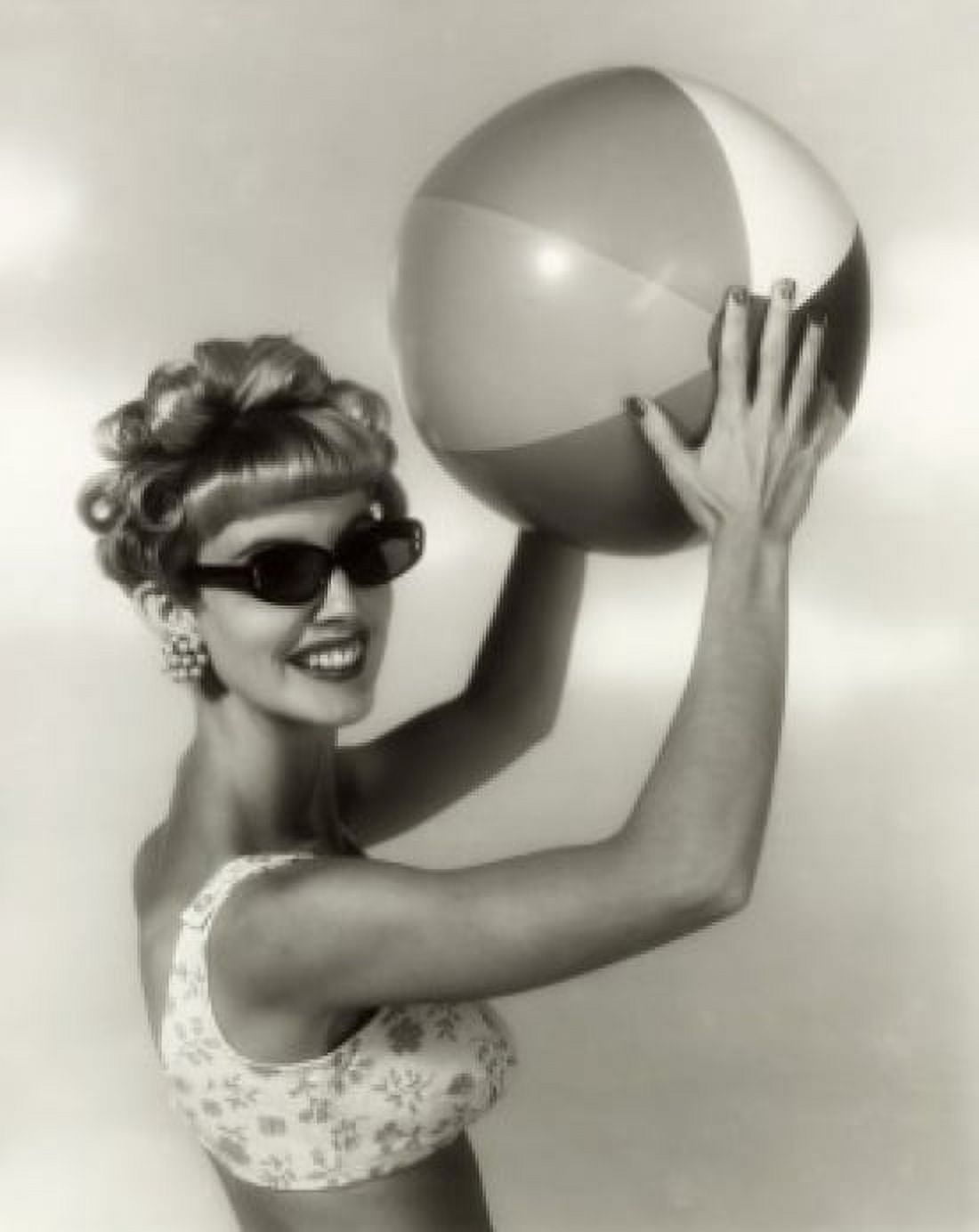 Close-up of a young woman holding a beach ball Canvas Art - (18 x 24)