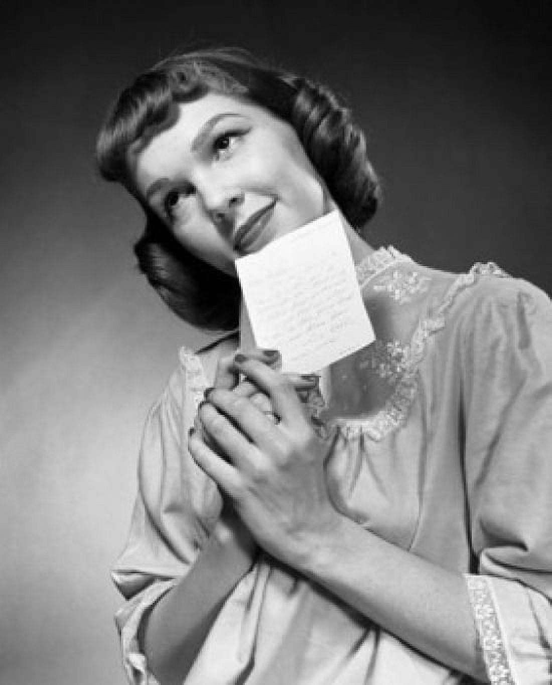 Close-up of a young woman holding a letter Canvas Art - (18 x 24)