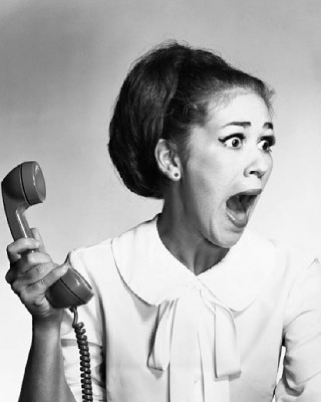 Close-up of a young woman holding a telephone receiver and shouting Canvas Art - (18 x 24)