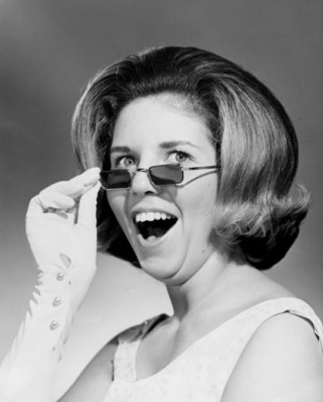Close-up of a young woman holding sunglasses Canvas Art - (18 x 24)
