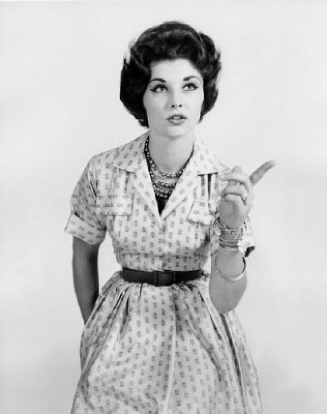 Close-up of a young woman pointing forward Canvas Art - (24 x 36)