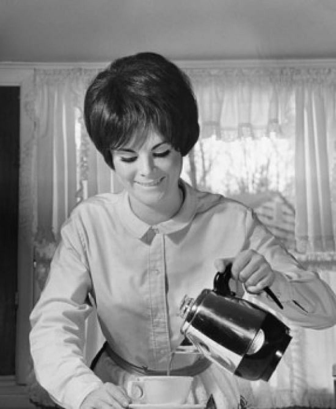 Close-up of a young woman pouring coffee into a cup from a coffee pot Canvas Art - (18 x 24)