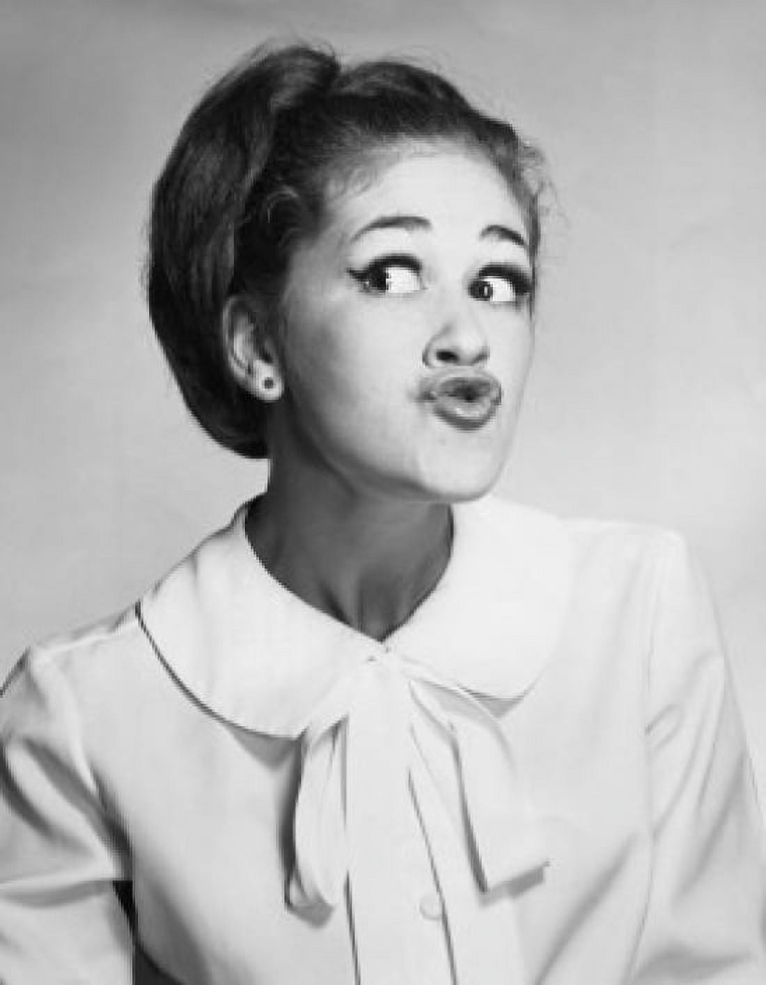 Close-up of a young woman puckering Canvas Art - (18 x 24)