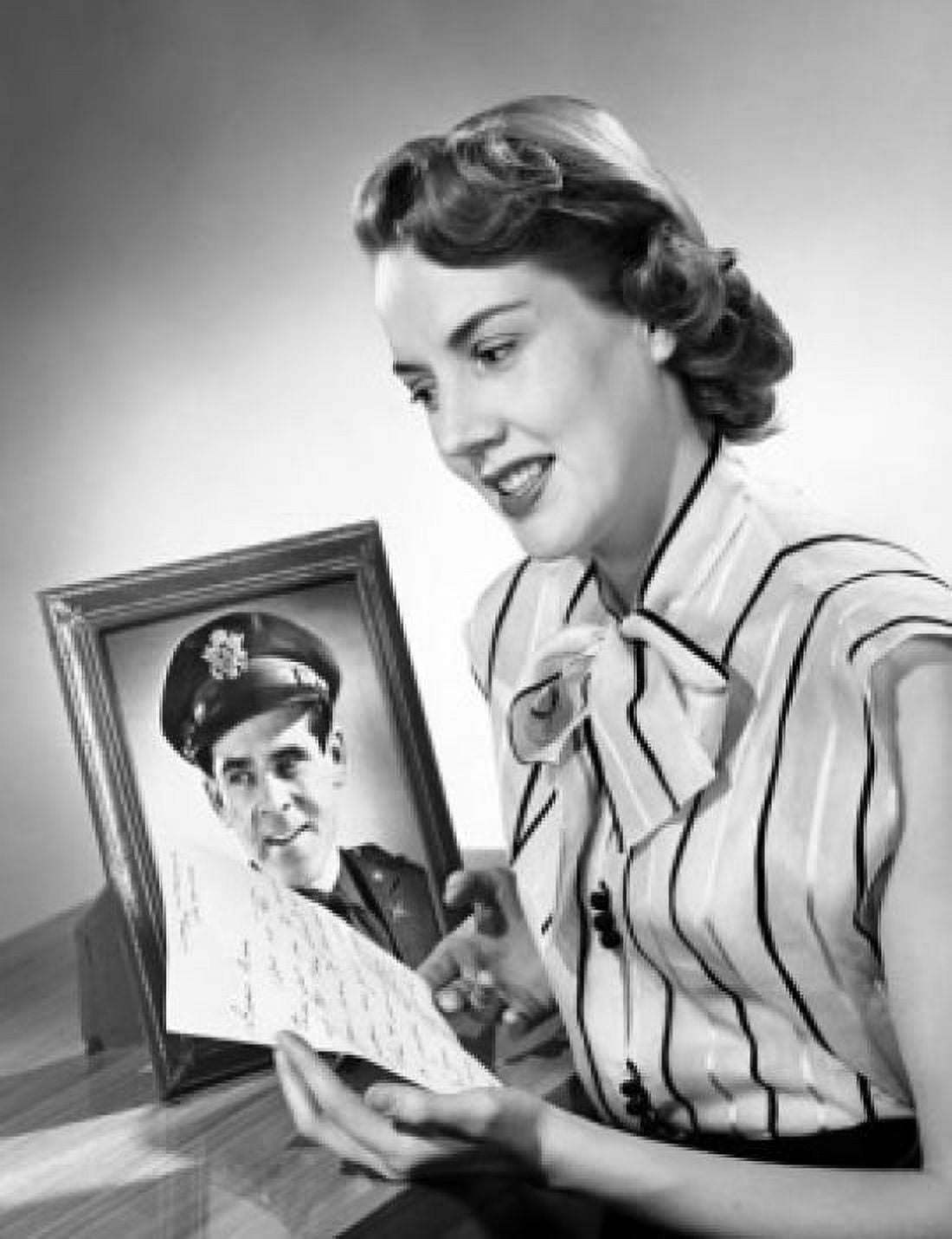 Close-up of a young woman reading a letter Canvas Art - (18 x 24)