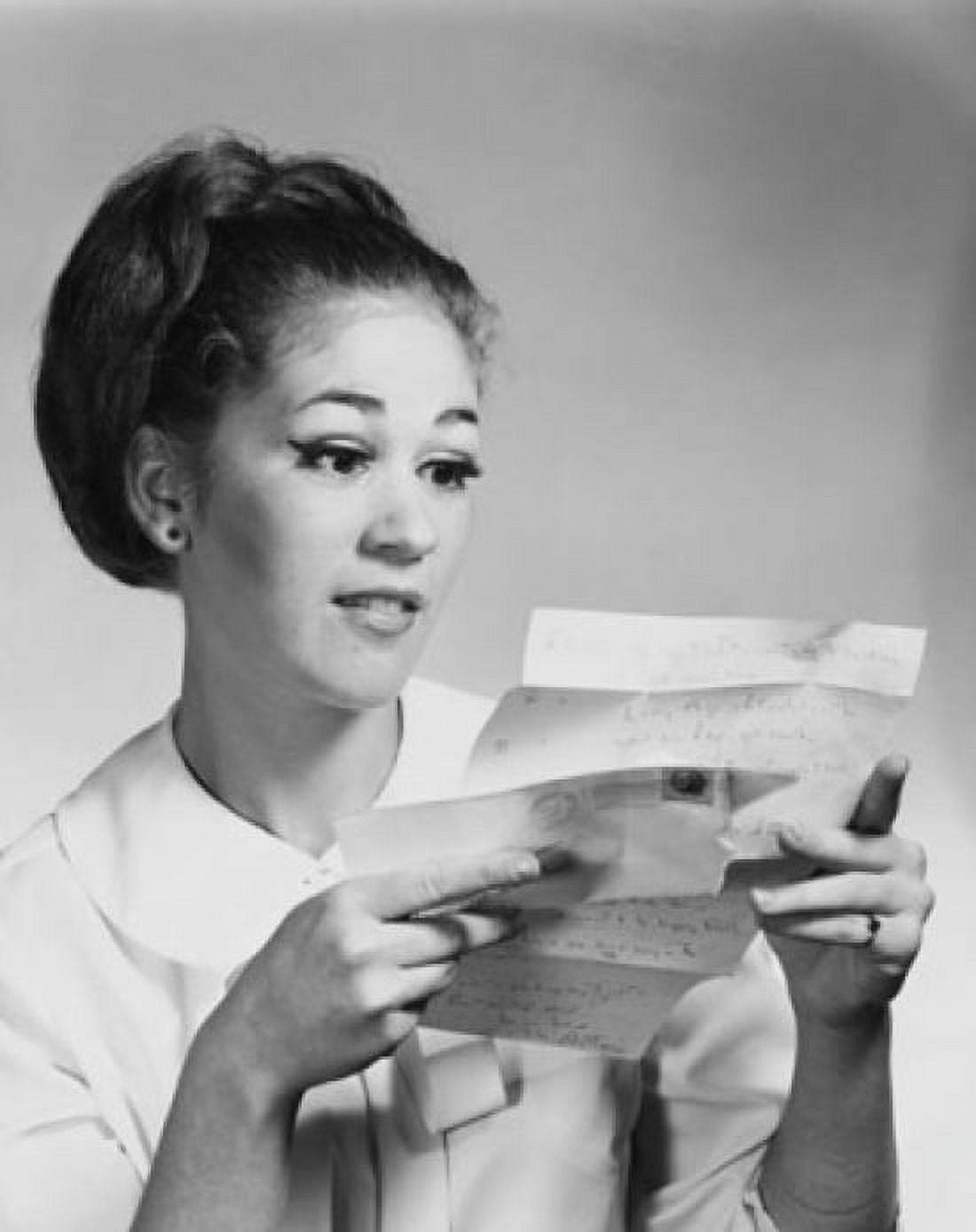 Close-up of a young woman reading a letter Canvas Art - (24 x 36)