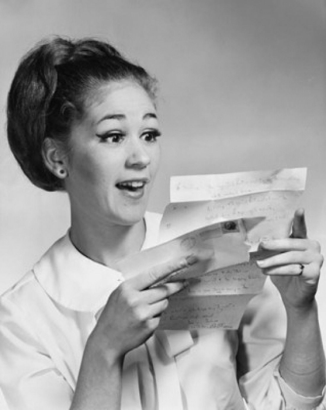 Close-up of a young woman reading a letter Canvas Art - (24 x 36)