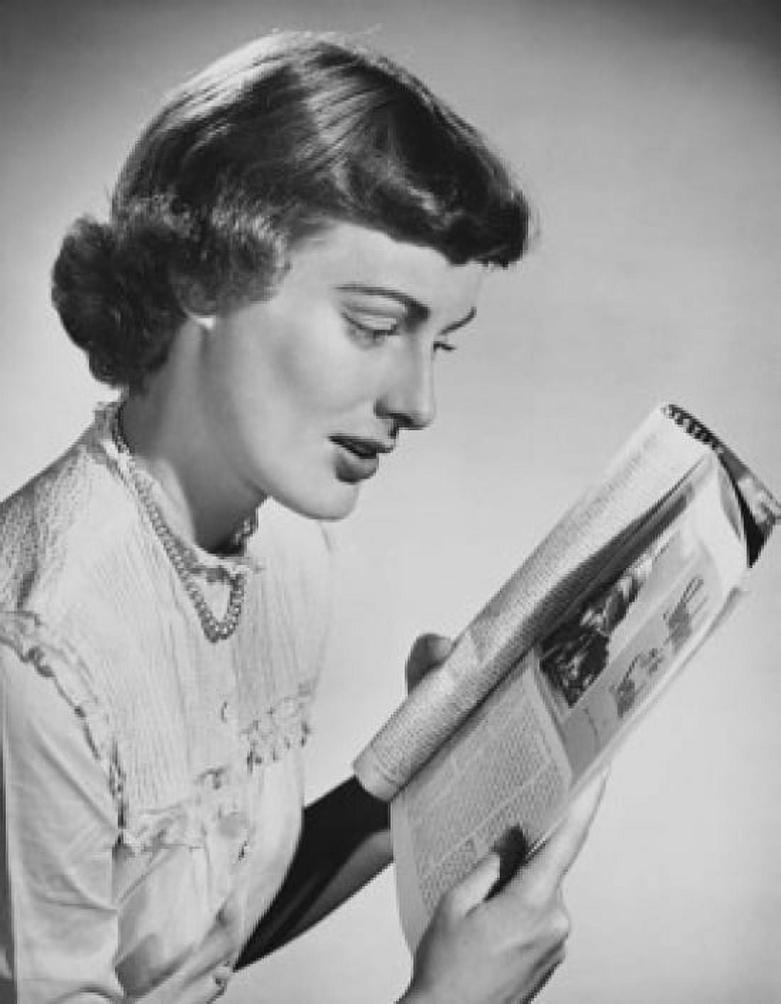 Close-up of a young woman reading a magazine Canvas Art - (18 x 24)