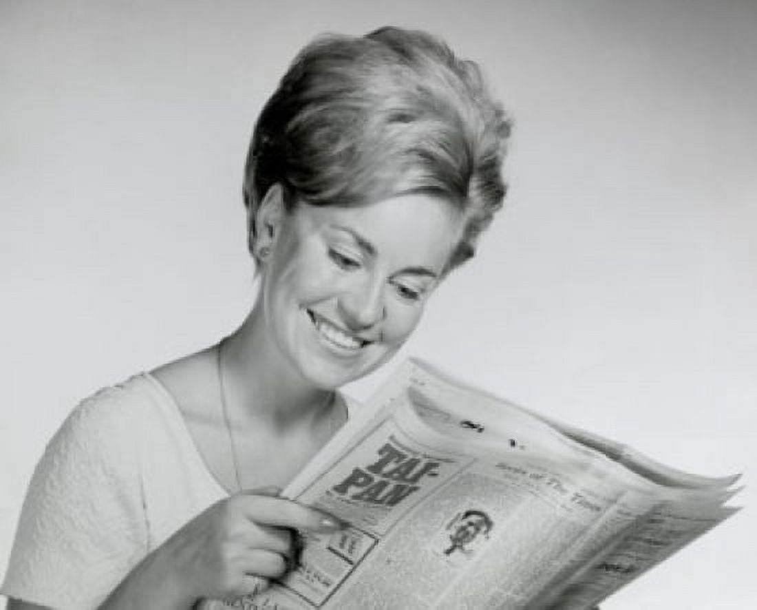 Close-up of a young woman reading a newspaper Canvas Art - (18 x 24)