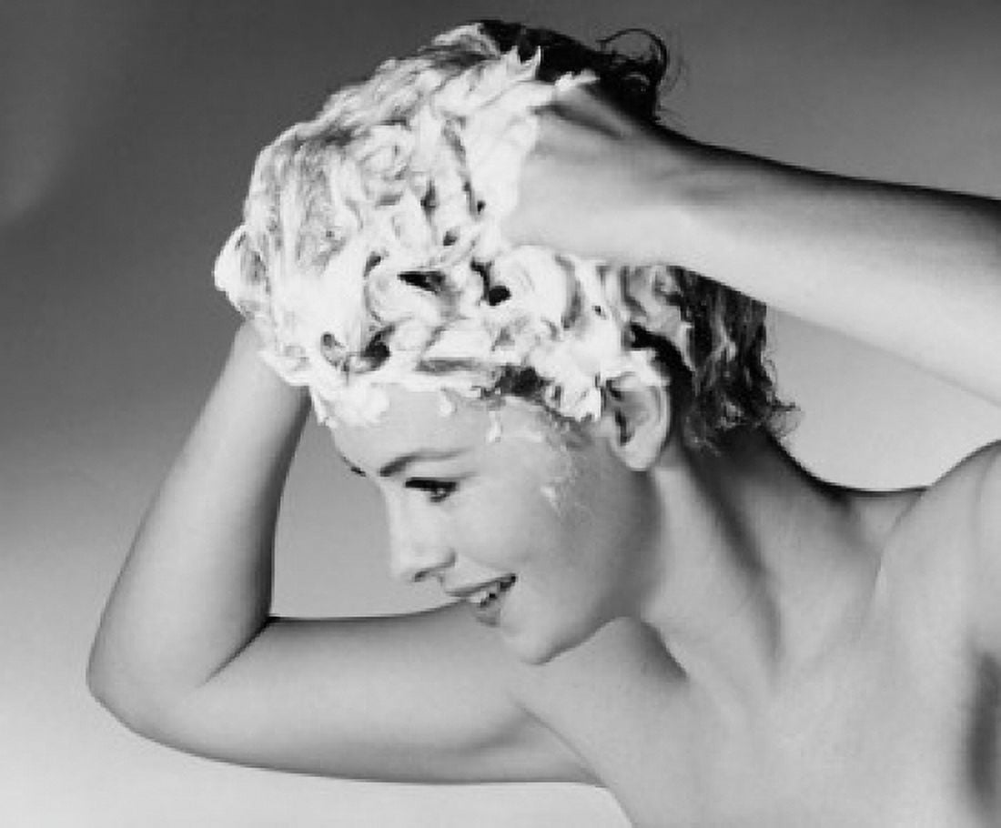 Close-up of a young woman shampooing her hair Canvas Art - (18 x 24)
