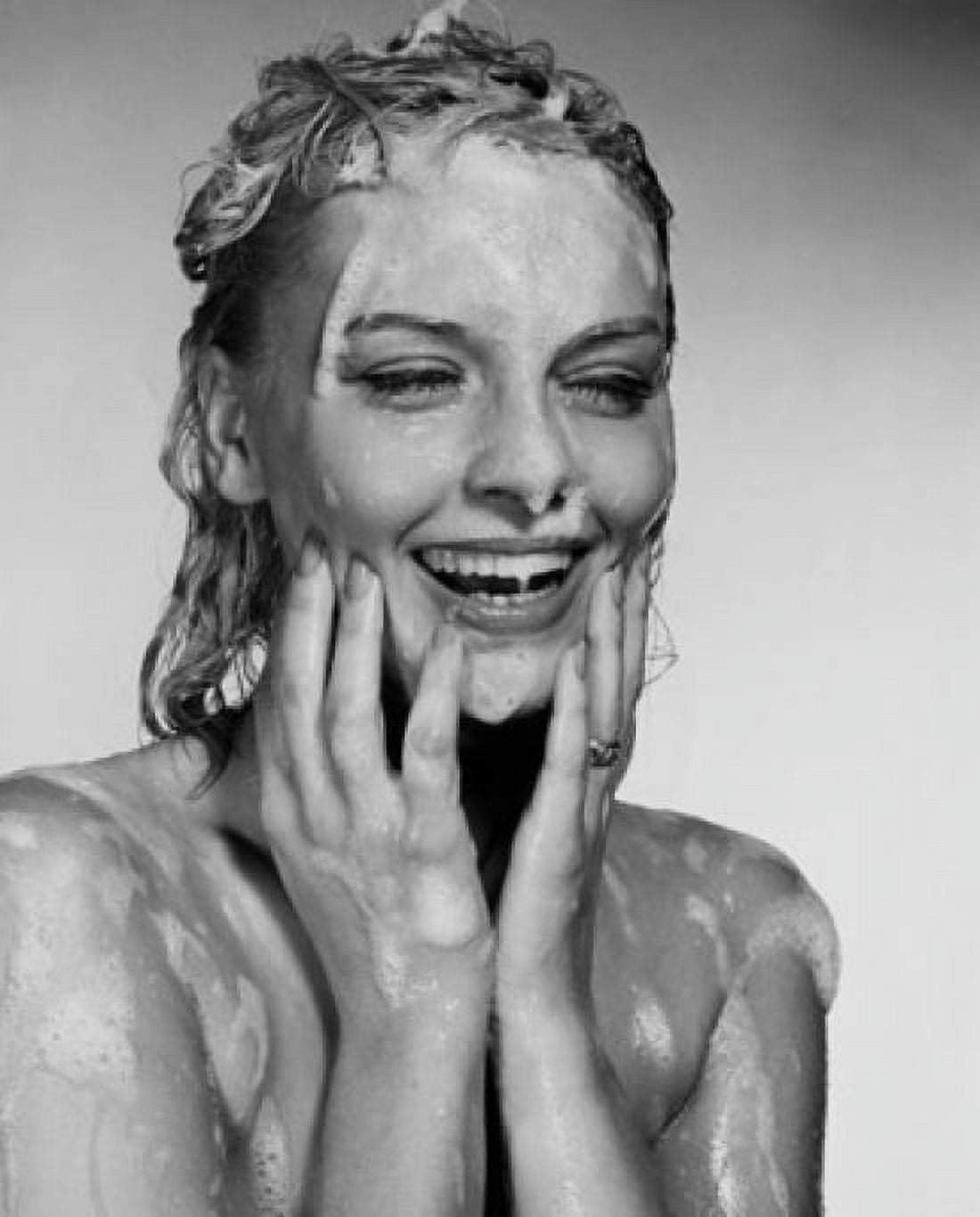 Close-up of a young woman taking a bath Canvas Art - (18 x 24)