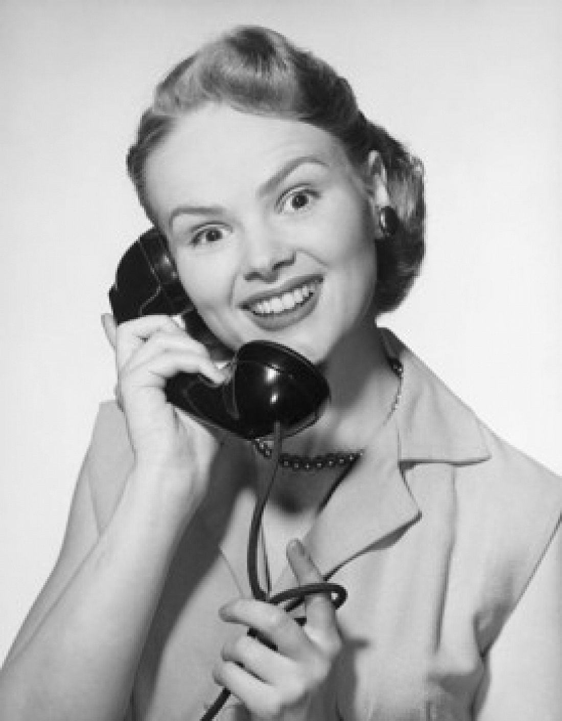 Close-up of a young woman talking on the telephone Canvas Art - (24 x 36)
