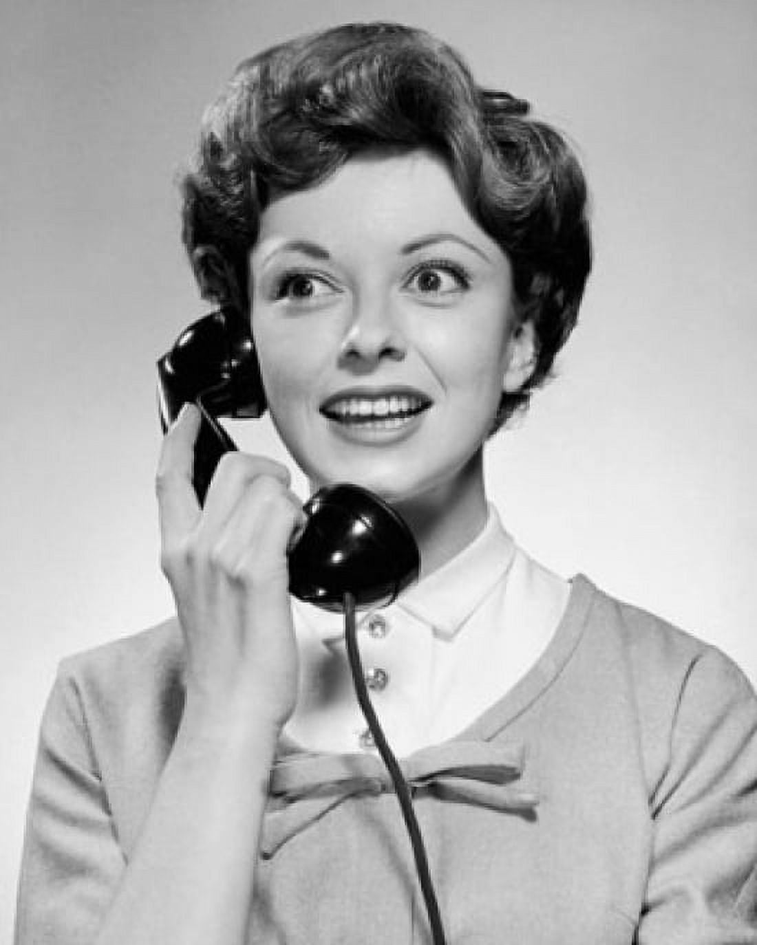 Close-up of a young woman talking on the telephone and smiling Canvas Art - (18 x 24)