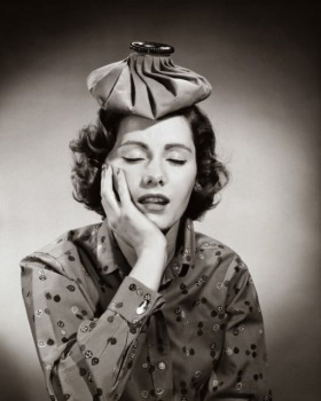 Close-up of a young woman with an ice pack on her head suffering from a headache Canvas Art - (18 x 24)