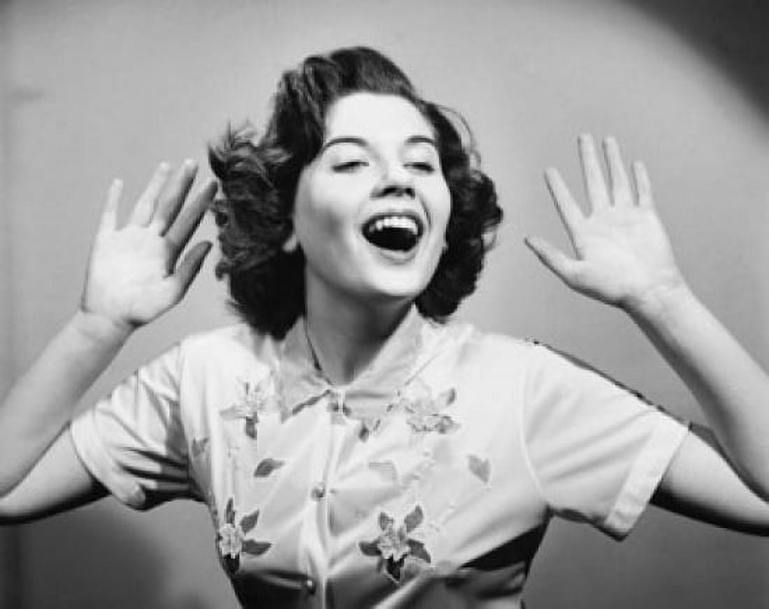 Close-up of a young woman with her arms raised and laughing Canvas Art - (18 x 24)