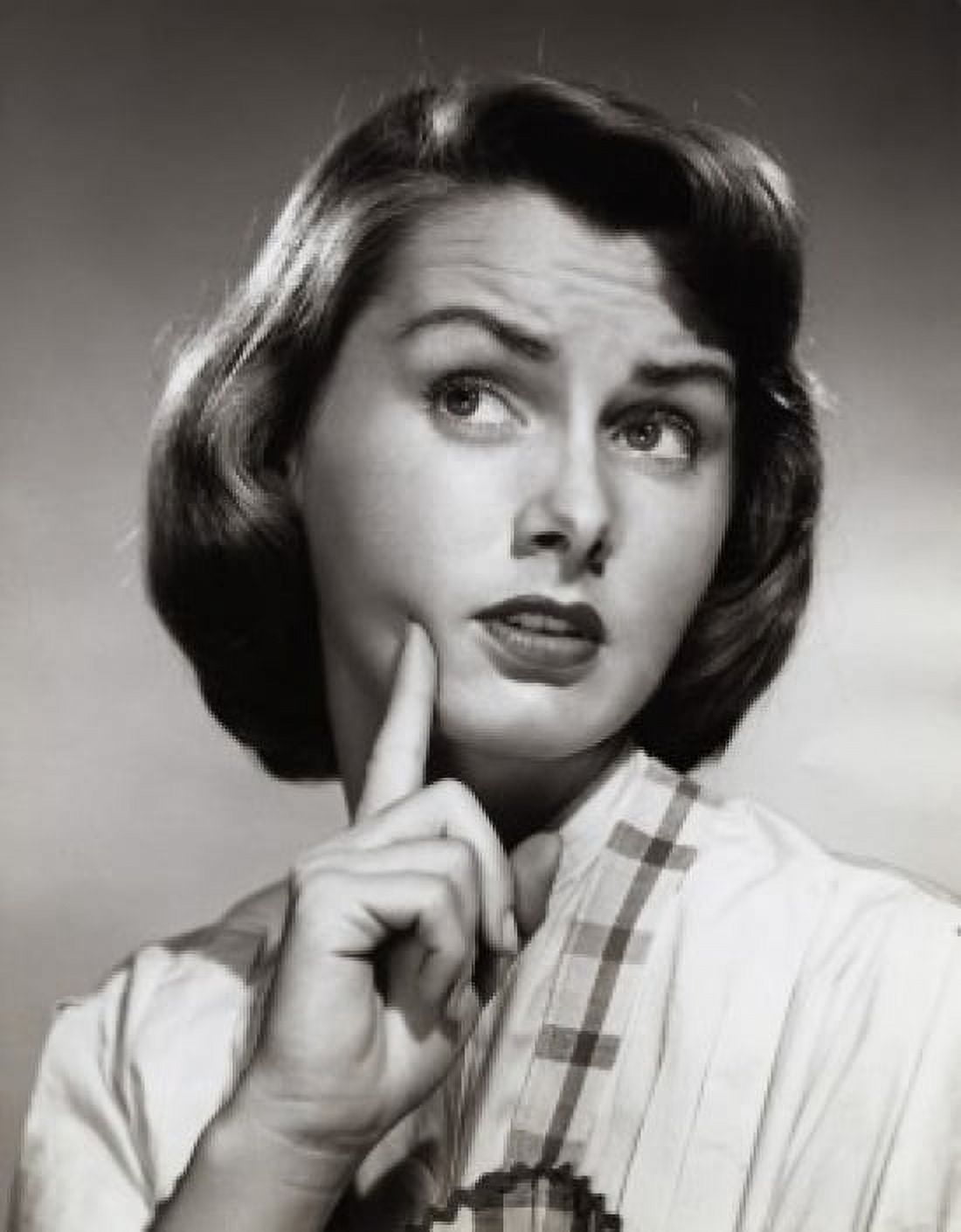 Close-up of a young woman with her finger on her face Canvas Art - (18 x 24)