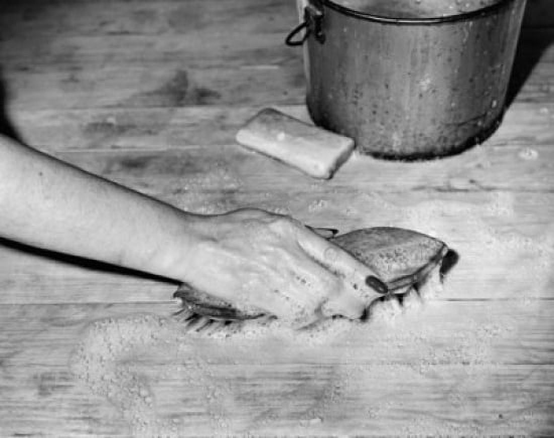 Close-up of a young womans hand cleaning the hardwood floor with a brush Canvas Art - (18 x 24)