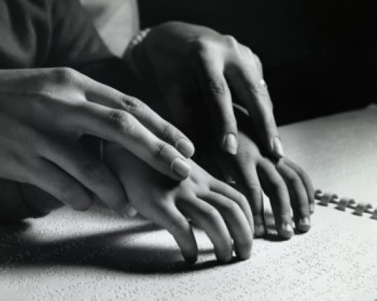 Close-up of an adult helping a blind child read Braille script Canvas Art - (18 x 24)