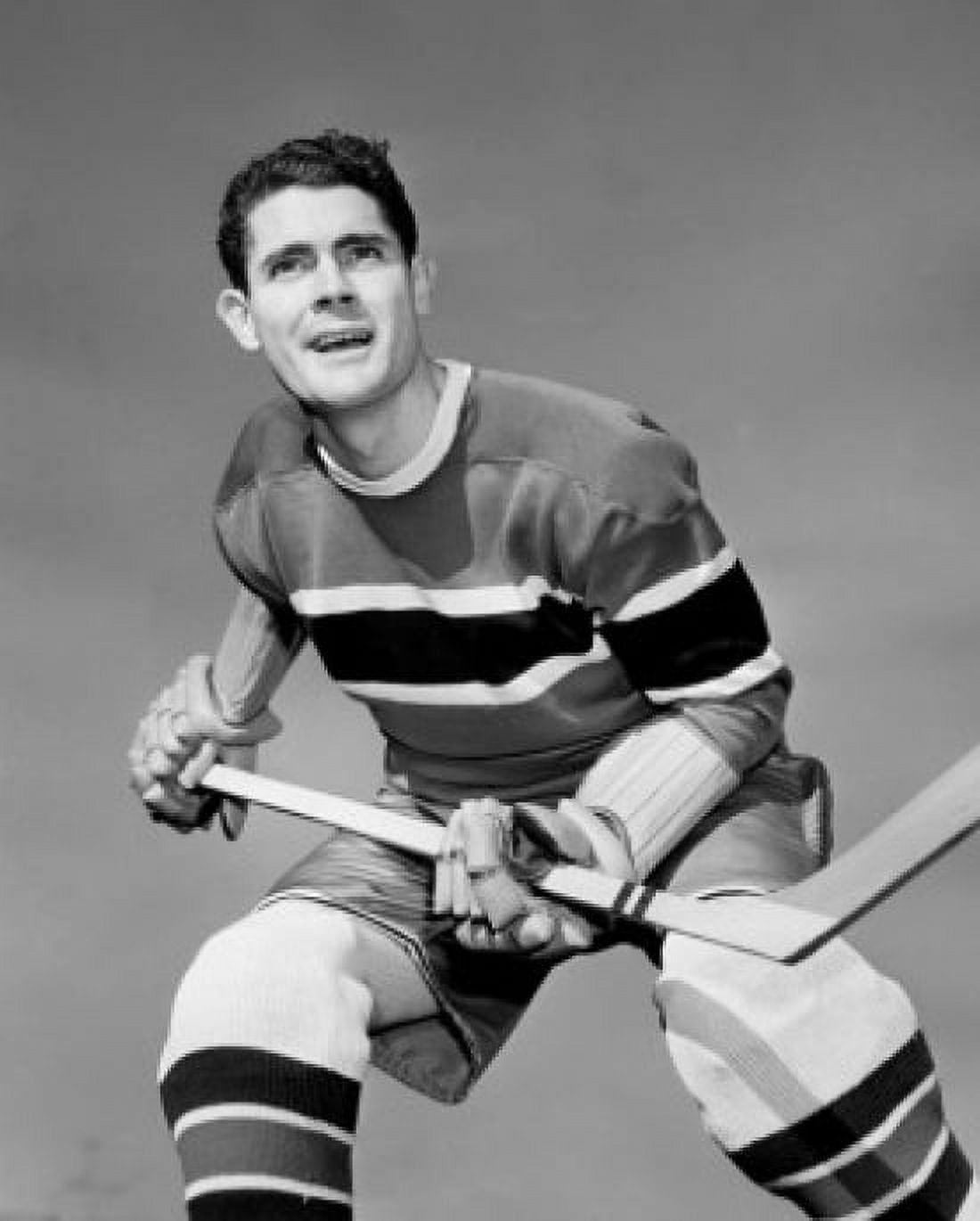 Close-up of an hockey player with a hockey stick Canvas Art - (24 x 36)