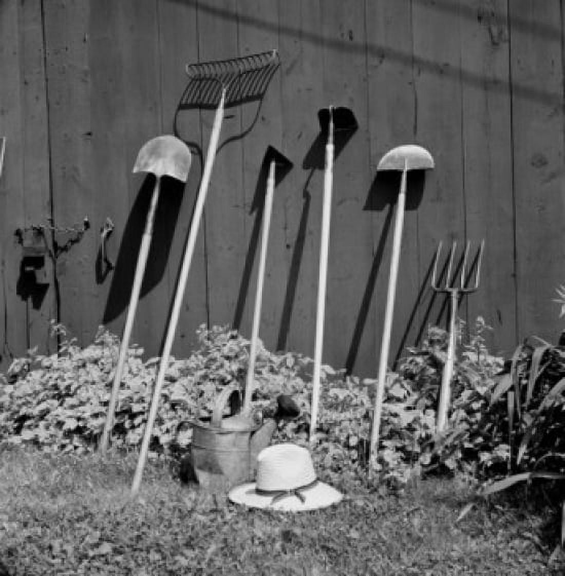 Close up of gardening tools leaning against wall Canvas Art - (18 x 24)