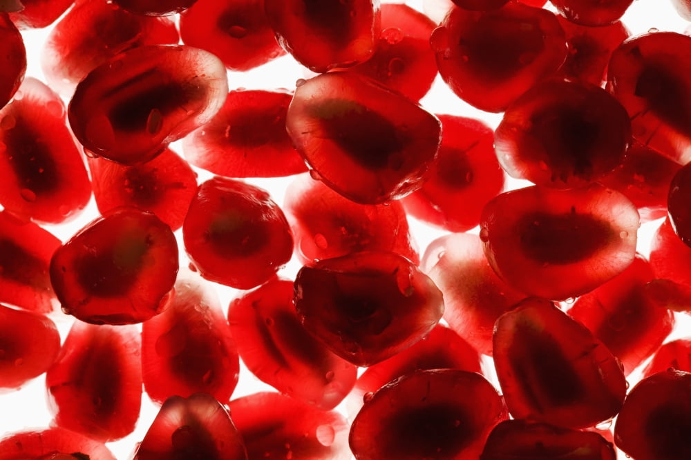 Close up of pomegranate seeds backlitCalgary alberta canada Canvas Art - Michael Interisano Design Pics (38 x 24)