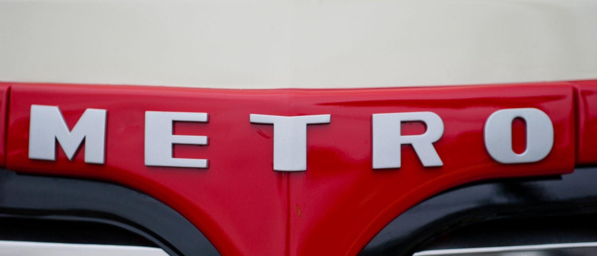 Close-up of the logo of Metros car Culver City Los Angeles County California USA Canvas Art - Panoramic Images (27 x 9)