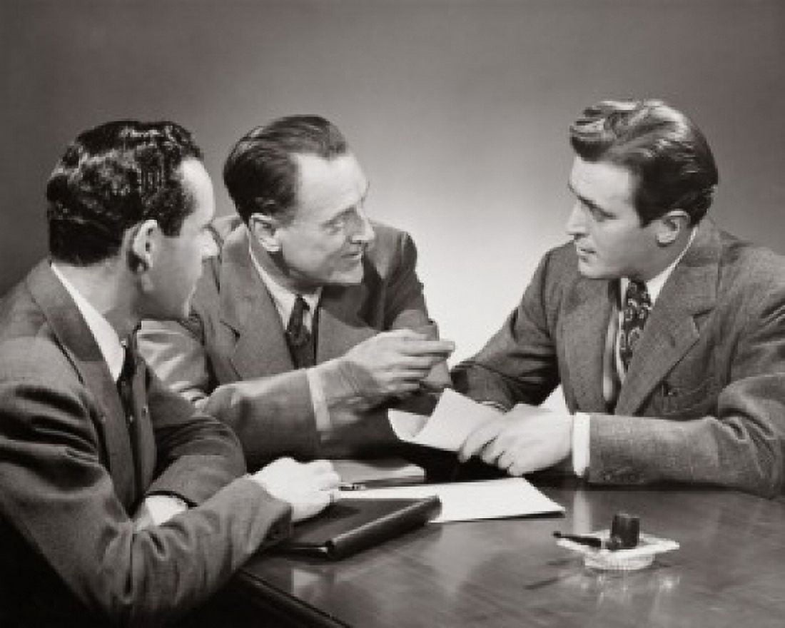 Close-up of three businessmen in a meeting Canvas Art - (18 x 24)