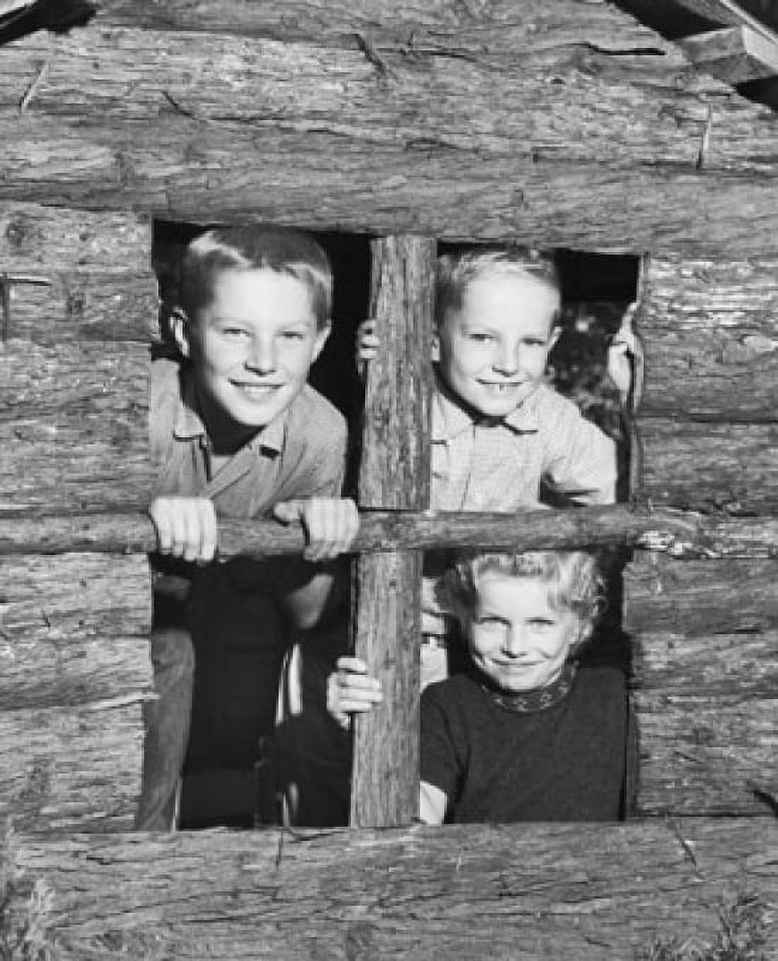 Close-up of three children looking through the window of a playhouse Canvas Art - (18 x 24)