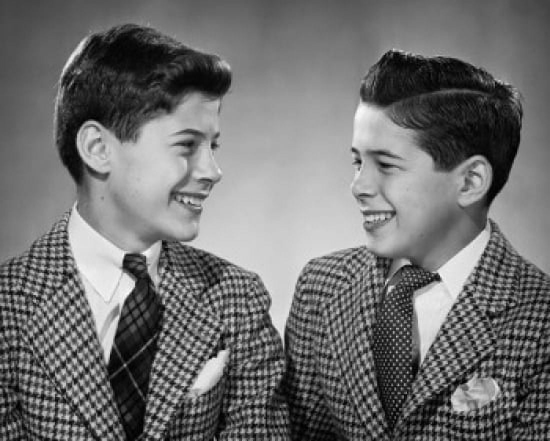 Close-up of twin brothers smiling at each other Canvas Art - (18 x 24)
