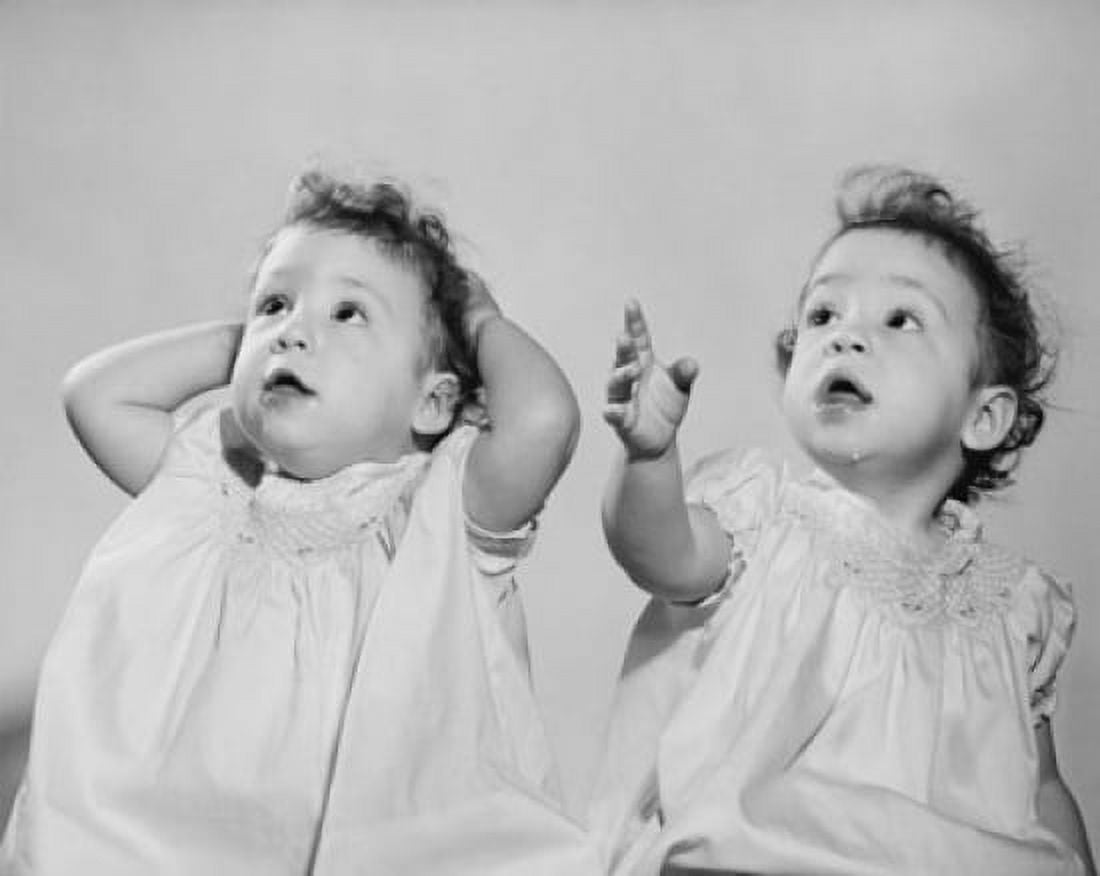 Close-up of twin sisters sitting together Canvas Art - (24 x 36)