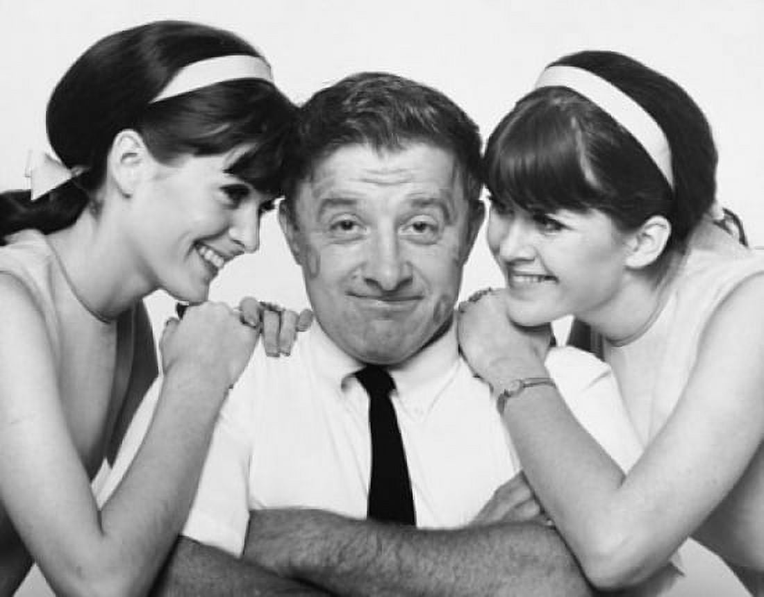 Close-up of two mid adult women flirting with a mid adult man Canvas Art - (24 x 36)