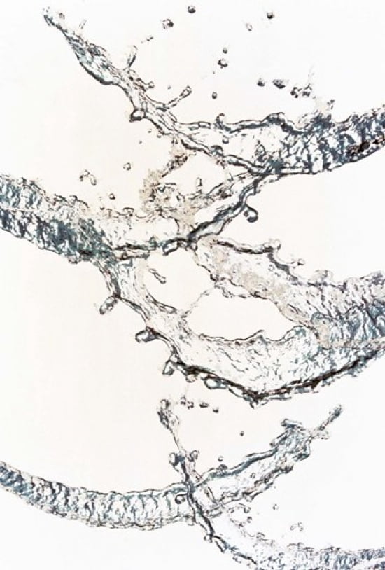 Close up of water bubbles zigzag across white background Canvas Art - Panoramic Images (25 x 36)