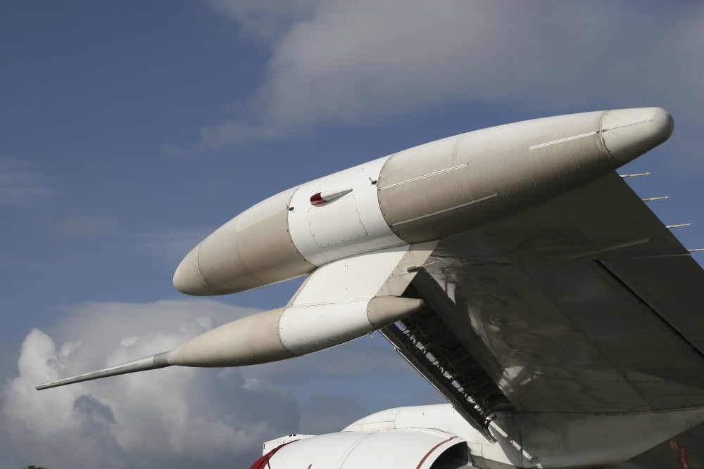 Close-up of wingtip ESM sensors on a E-6A Mercury aircraft Canvas Art - Timm ZiegenthalerStocktrek Images (18 x 12)