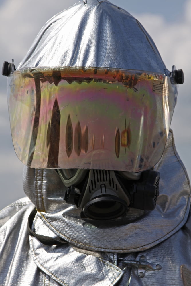 Close-up view of a firefighter in a fire proximity suit Canvas Art - Stocktrek Images (23 x 34)