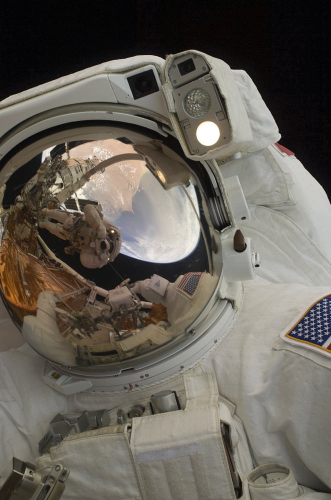Close-up view of an astronaut during a spacewalk Canvas Art - Stocktrek Images (23 x 34)
