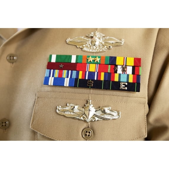 Close-up view of military decorations and honors on the uniform of a Petty Officer Poster Print
