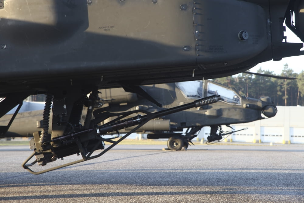 Close-up view of the M230 chain gun on an AH-64D Apache helicopter Canvas Art - Timm ZiegenthalerStocktrek Images (35 x 23)