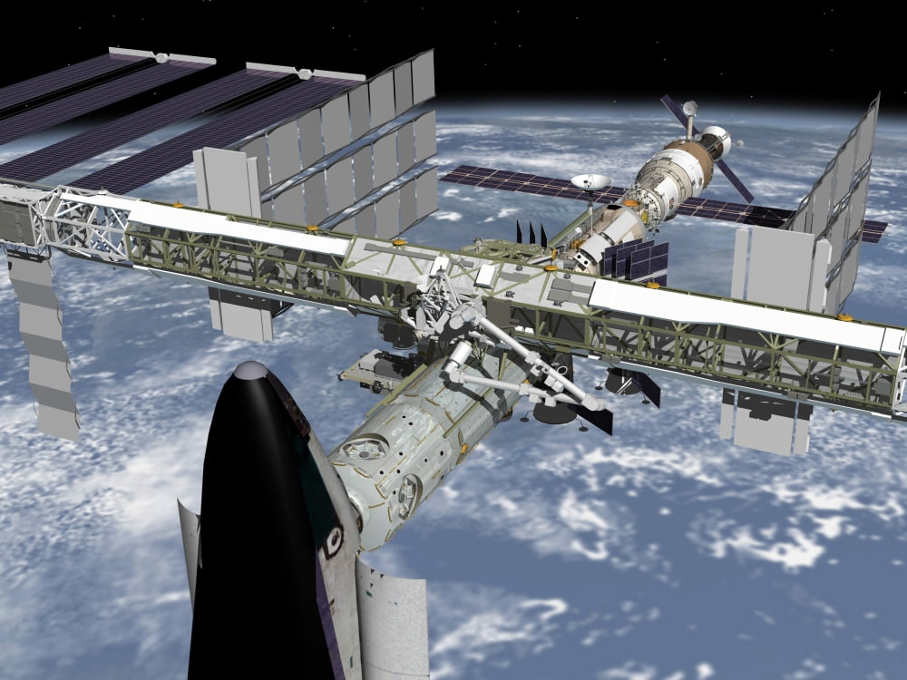 Close up view of the Shuttle docked to Node 2 of the International Space Station Canvas Art - Stocktrek Images (32 x 24)