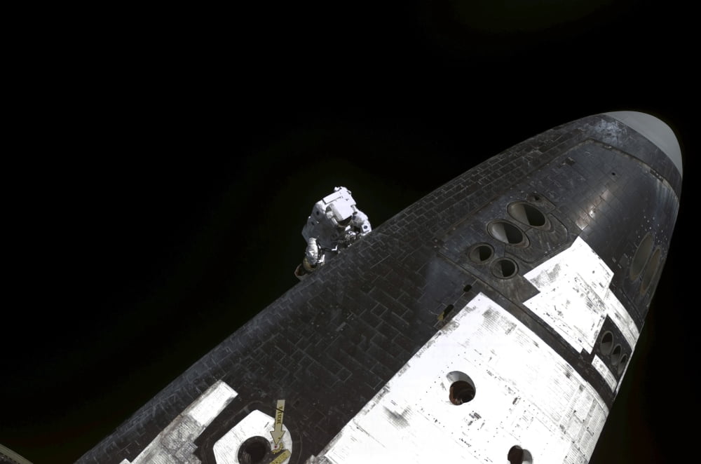 Close-up view of the nose cone on Space Shuttle Discovery Canvas Art - Stocktrek Images (34 x 23)