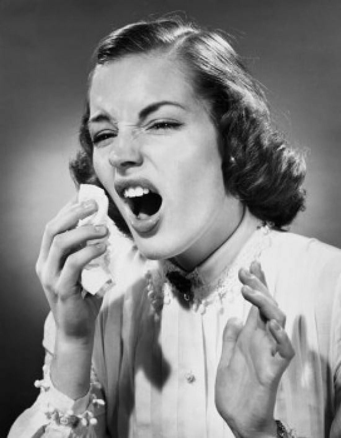 Close-up view of young woman sneezing Canvas Art - (24 x 36)