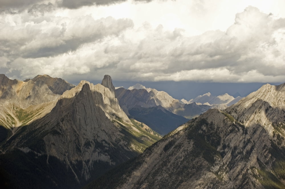 Cloud over rugged mountain peaksBanff alberta canada Canvas Art - Jim Julien Design Pics (38 x 24)