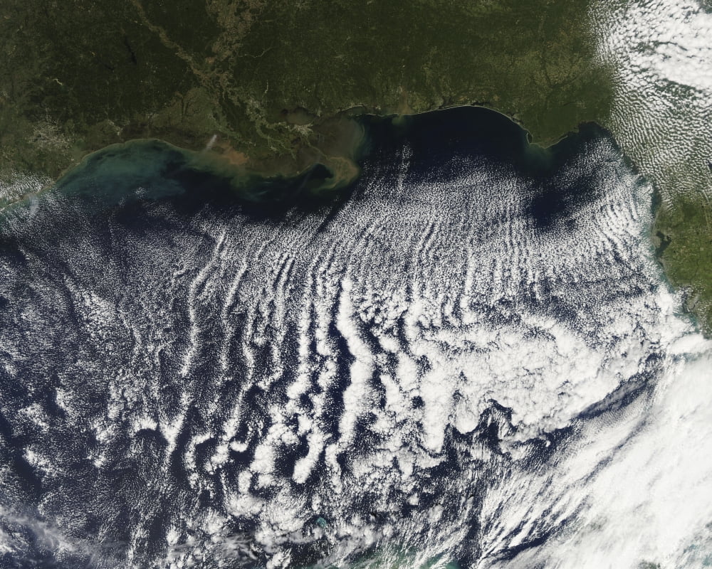Cloud streets are visible stretching out into the Gulf of Mexico Canvas Art - Stocktrek Images (32 x 25)