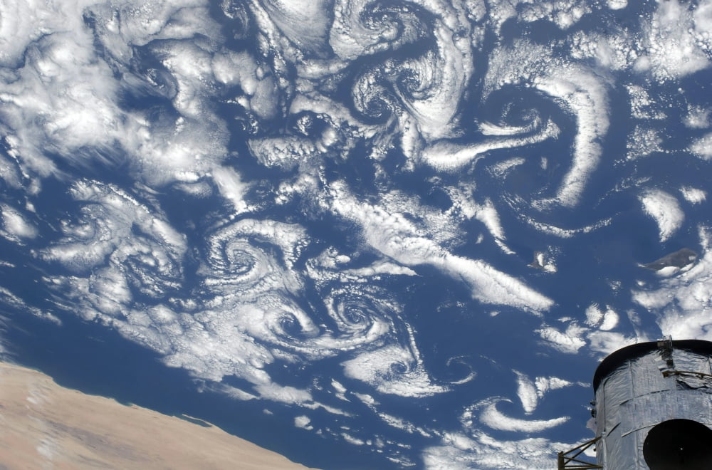 Cloud vortex streets off the coast of northwestern Africa Canvas Art - Stocktrek Images (35 x 23)