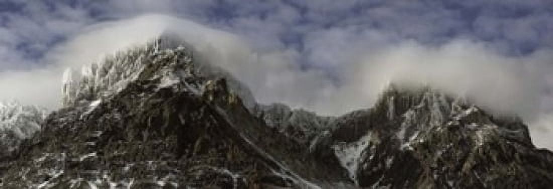 Clouds over Snowcapped mountain range Paine Massif Torres del Paine National Park Magallanes Region Patagonia Chile Canvas Art - Panoramic Images (18 x 7)