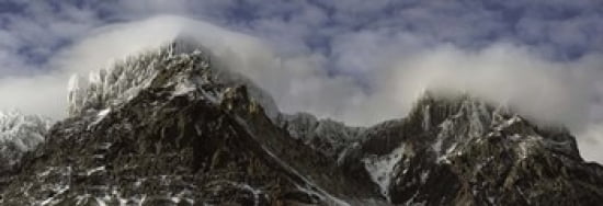 Clouds over Snowcapped mountain range Paine Massif Torres del Paine National Park Magallanes Region Patagonia Chile Canvas Art - Panoramic Images (36 x 13)