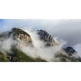 thumbnail image 1 of Clouds gather around Rocky mountain peaks; Field British Columbia Canada Poster Print by Lorna Rande12575417, 1 of 3