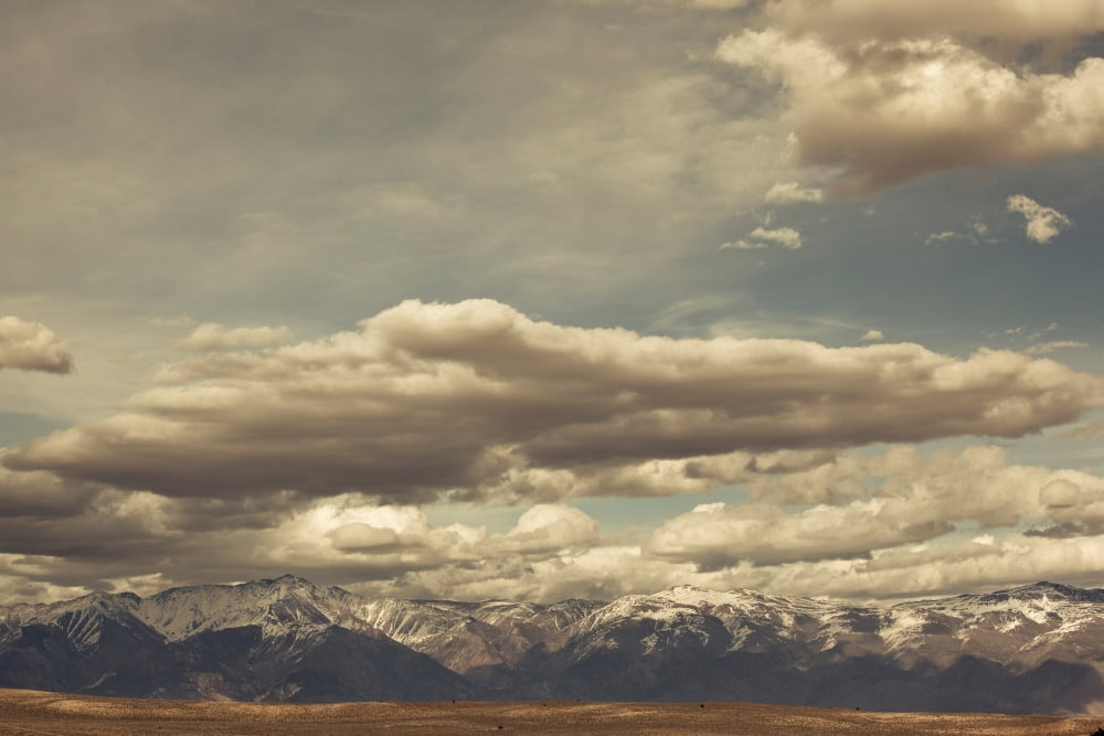 Clouds over Sierra Nevada Mountains Alta Vista Inyo County California USA Canvas Art - Panoramic Images (27 x 9)
