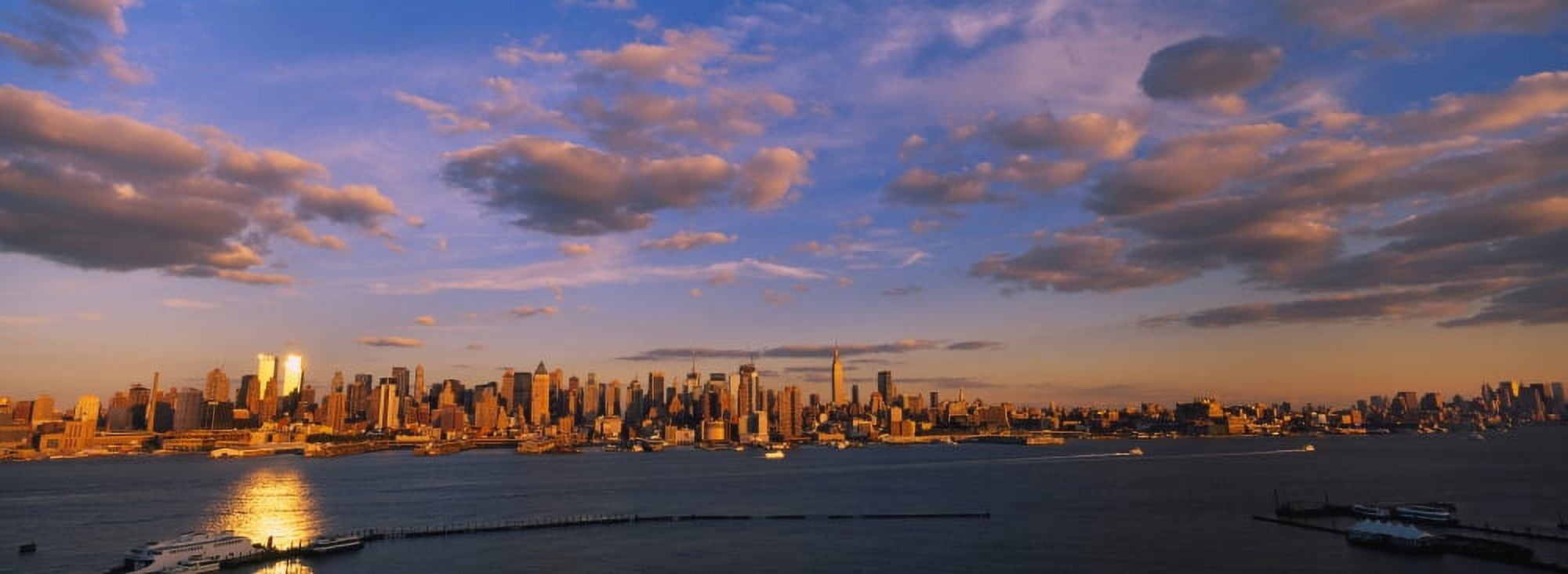 Clouds over a city at sunset Manhattan New York City New York State USA Canvas Art - Panoramic Images (27 x 9)