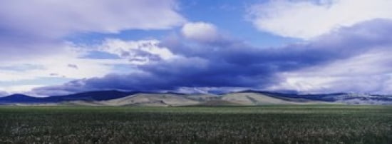 Clouds over a hill range Montana USA Canvas Art - Panoramic Images (36 x 13)